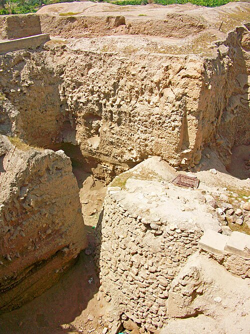 Excavated walls and tower of ancient Jericho (Tell es-Sultan)