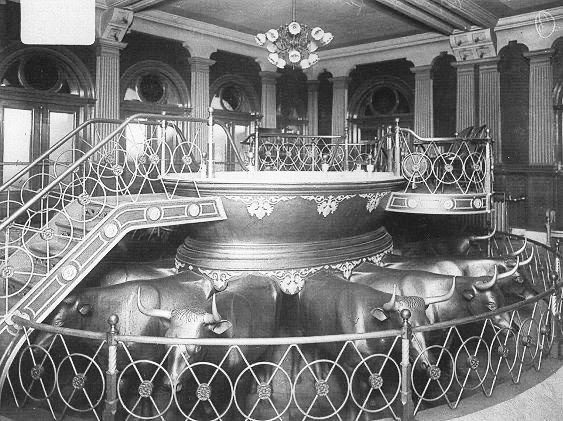 Historical photograph of the Salt Lake Temple baptismal font resting on twelve sculpted oxen