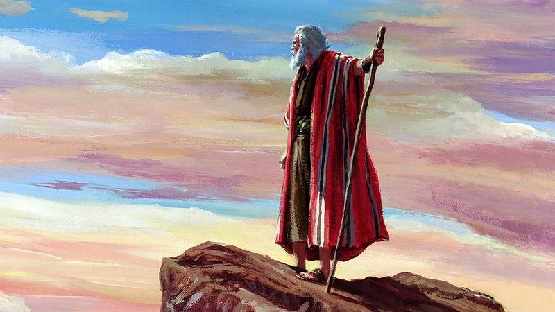 Moses standing on Mount Nebo overlooking the promised land